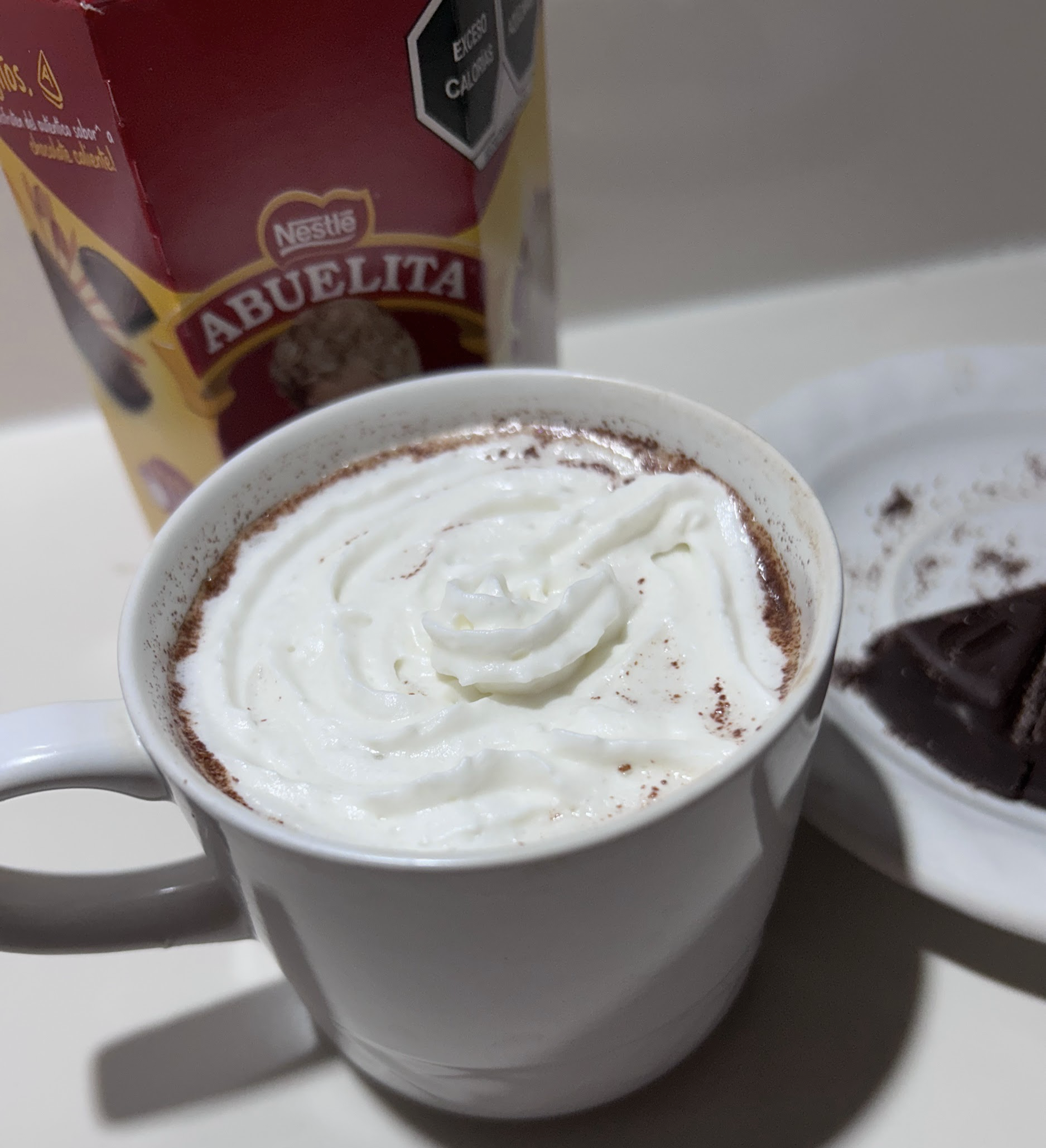 Prepared ABUELITA hot chocolate with whipped cream topping