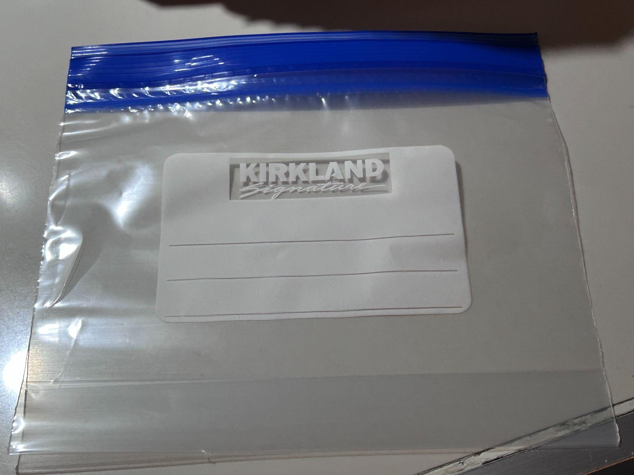 Close-up of a single Kirkland bag showing the slider top and label area