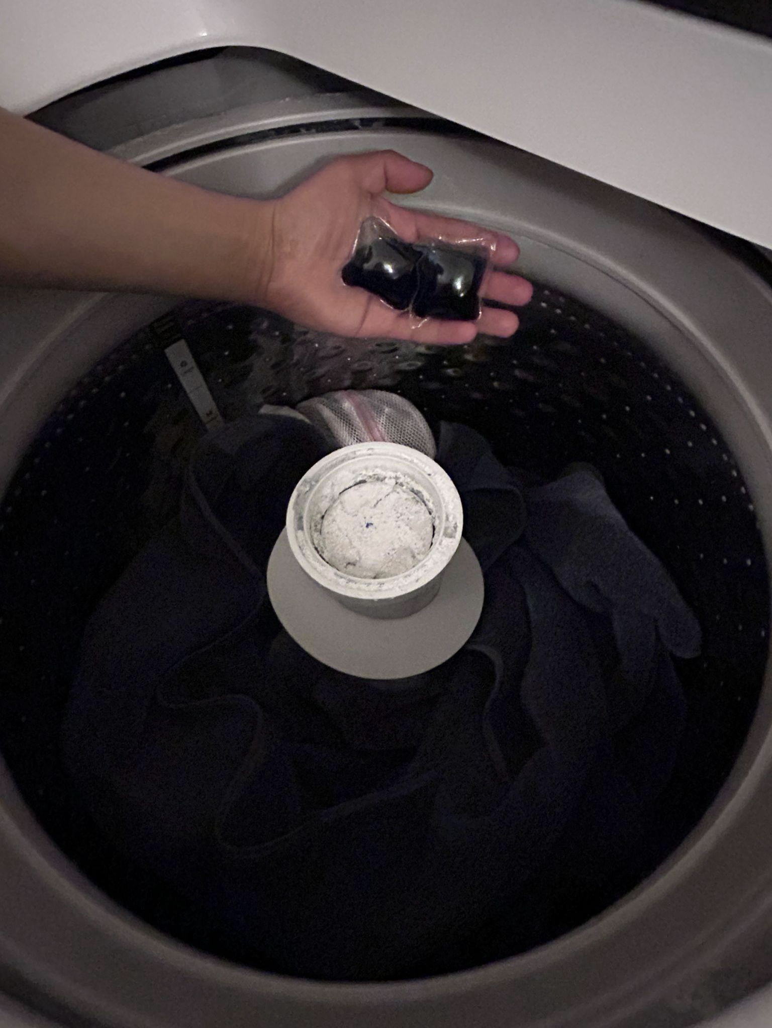 Two capsules over the washing machine