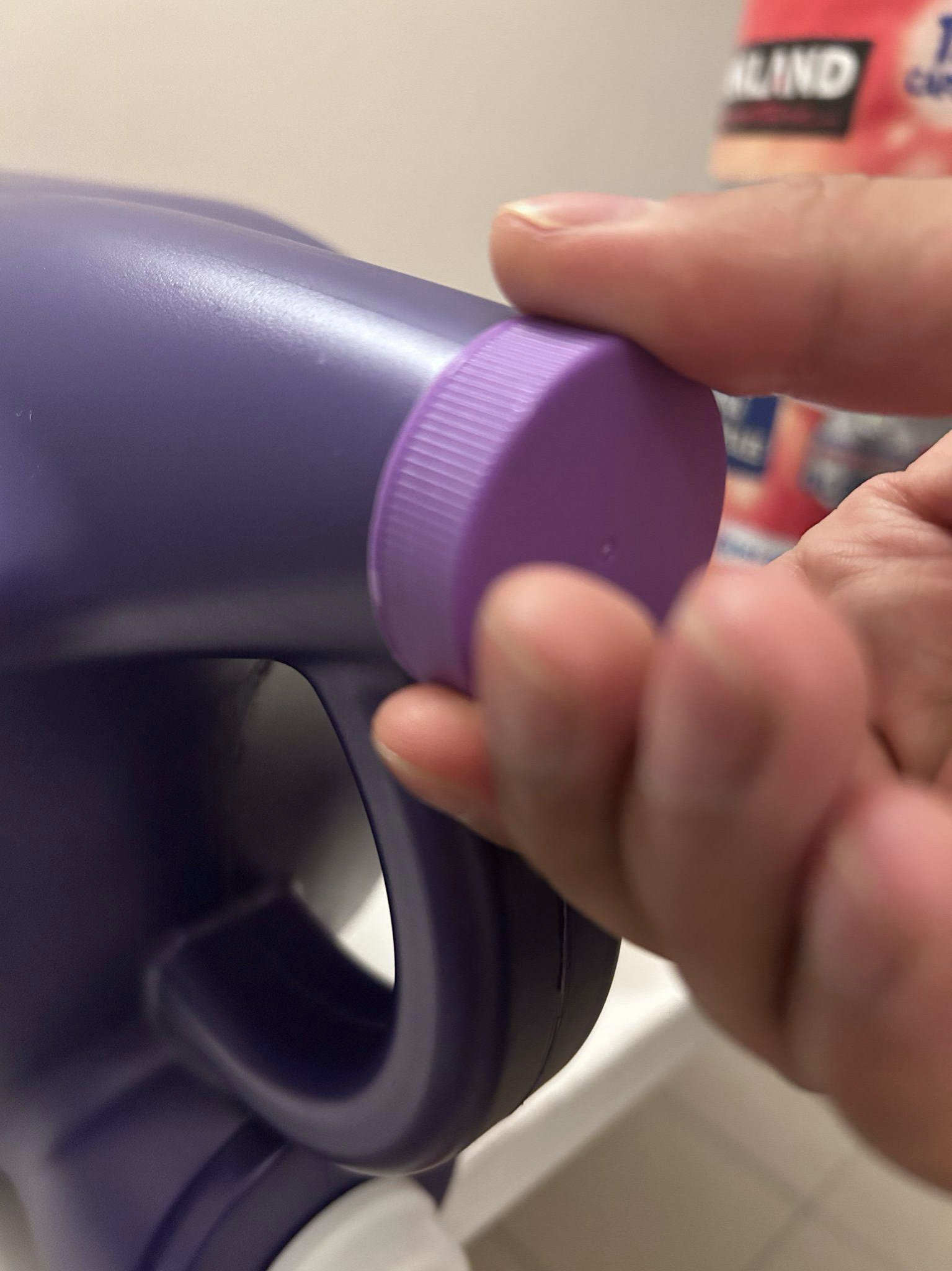 Loosen the top cap slightly