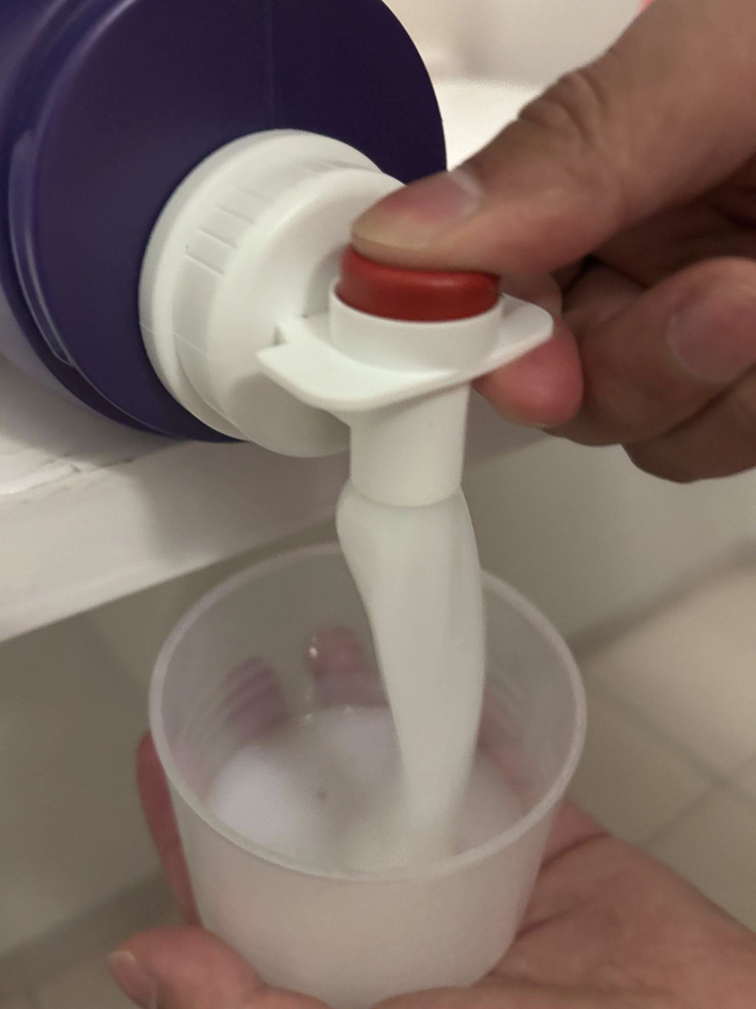 Press the red button to dispense